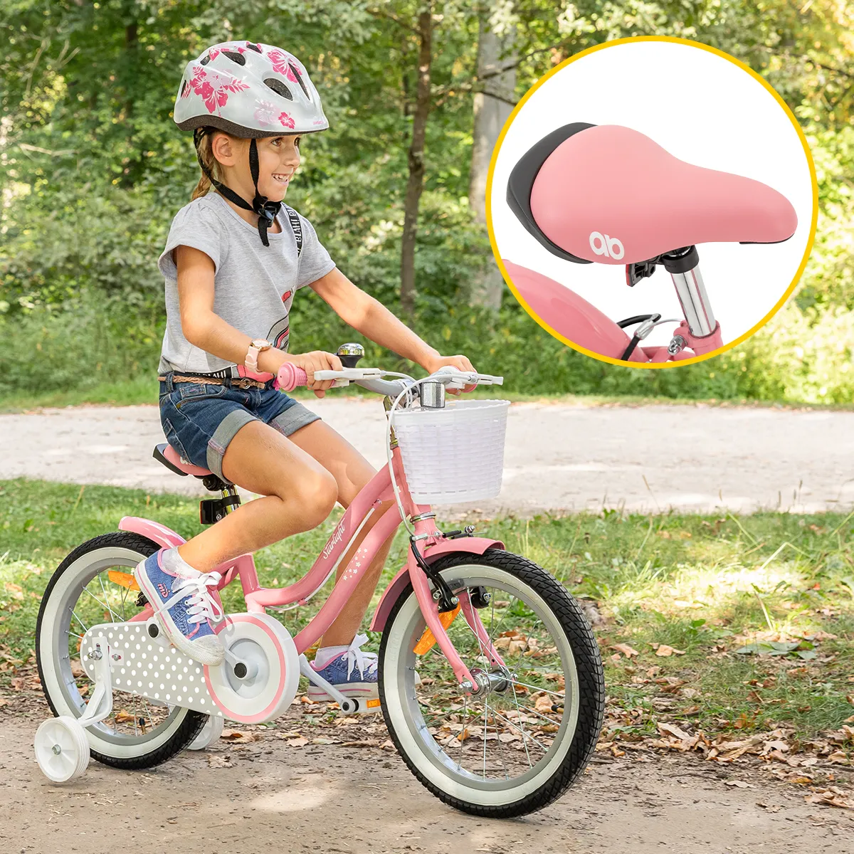 Verstellbare Lenker- und Sitzhöhe Mädchen fährt mit dem 16-Zoll-Kinderfahrrad Starlight über Waldweg, vergrößerter Sattel