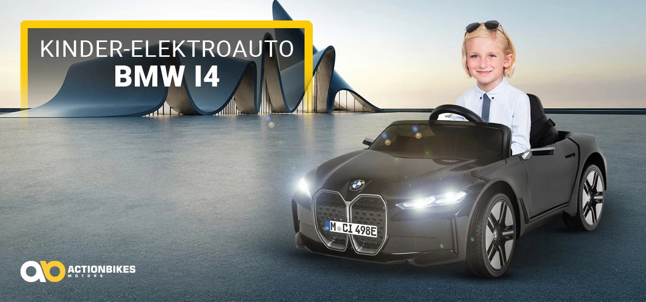 L&auml;chelnder Junge steuert das Kinder-Elektroauto BMW i4> </div> </div> <div class=