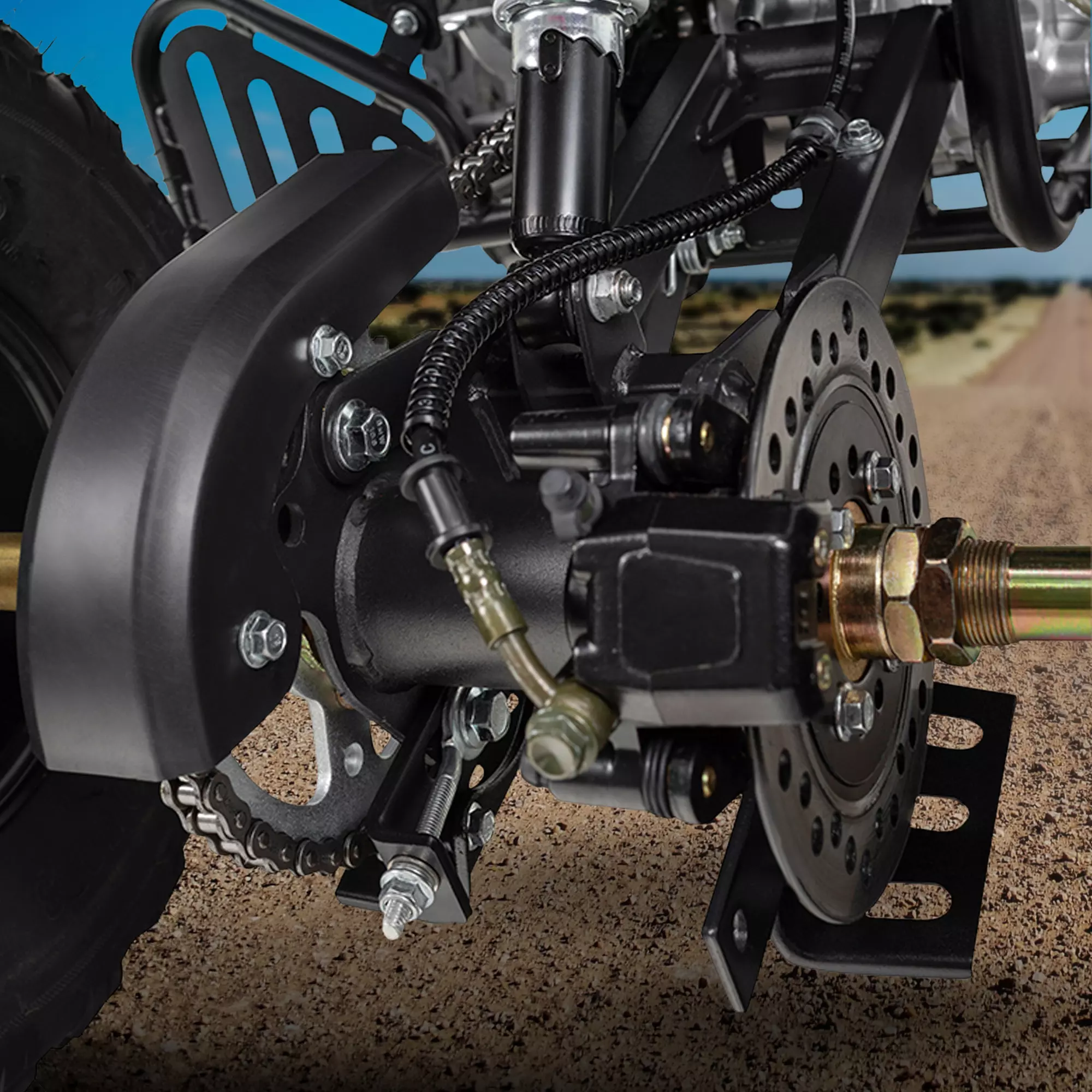 Mit hydraulischen Scheiben- und Trommelbremsen Vergrößerte Bremsen in schwarzer Farbe am Pocket-Quad