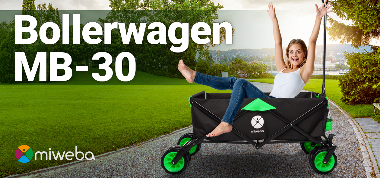 Miweba Bollerwagen MB-30 Frau sitzt im Miweba Bollerwagen MB-30 auf Kiesweg und wirft Arme in die Luft